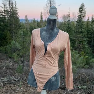 Beige button up body suit